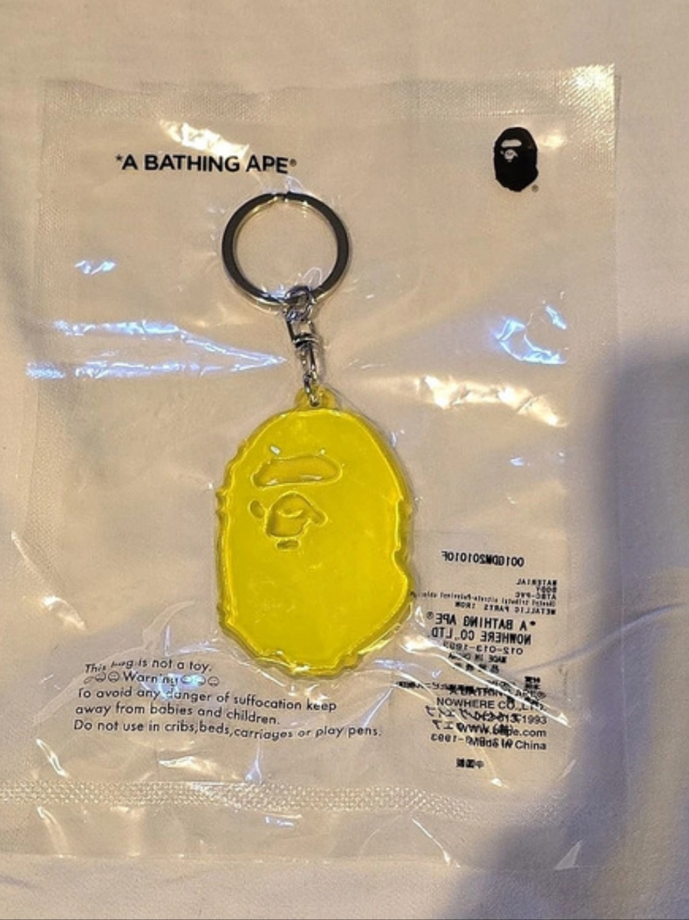 New In Package BAPE Ape Head Reflective Keychain Yellow Neon - Brand New Sealed
